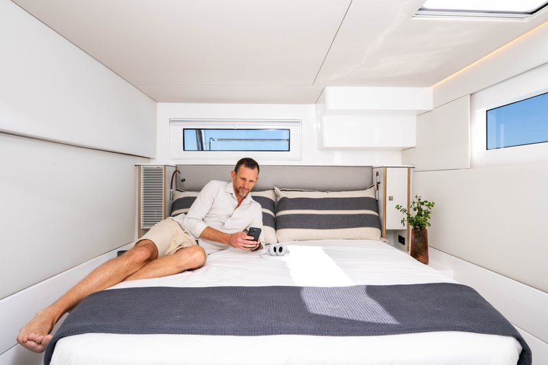 Spacious catamaran cabin with comfortable bed