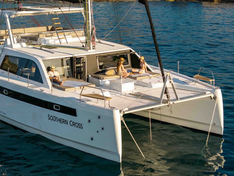 The Southern Cross catamaran anchored in calm BVI waters